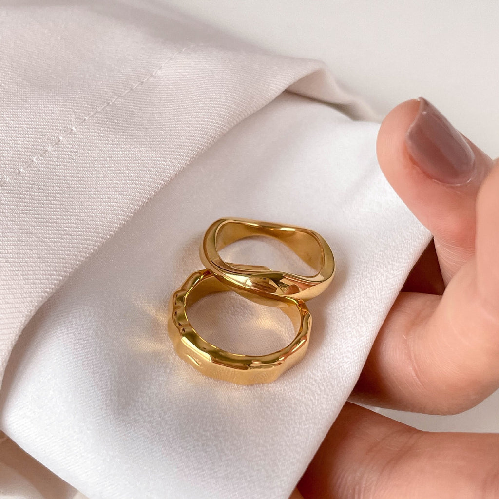 Romantic series wave-shaped rings made of titanium and steel material